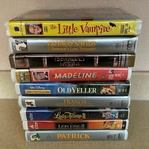 9 VHS movies with original boxes included!